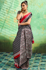 Amazing Black Ajrakh Printed Semi Modal Silk Saree With Beguiling Blouse Piece