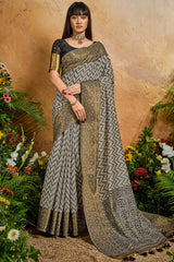 Fairytale Black Viscose Cotton Patola Silk Saree With Deserving Blouse Piece