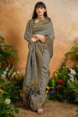 Fairytale Black Viscose Cotton Patola Silk Saree With Deserving Blouse Piece