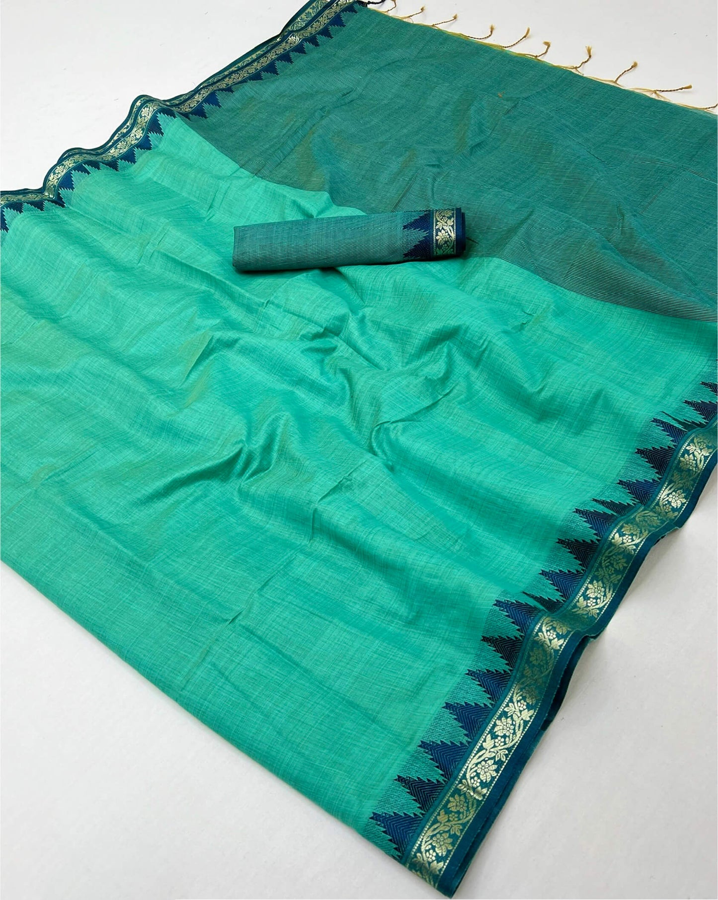 Fancifull Turquoise Cotton Silk Saree With Vibrant Blouse Piece
