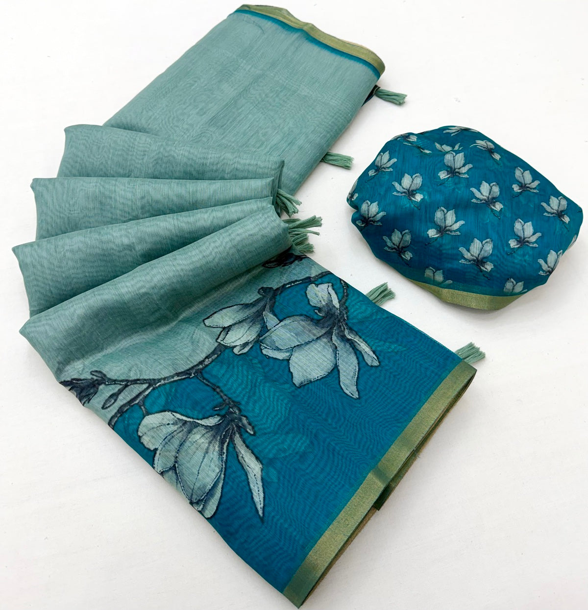 Enchanting Sea Green Printed Cotton Silk Saree With Felicitous Blouse Piece