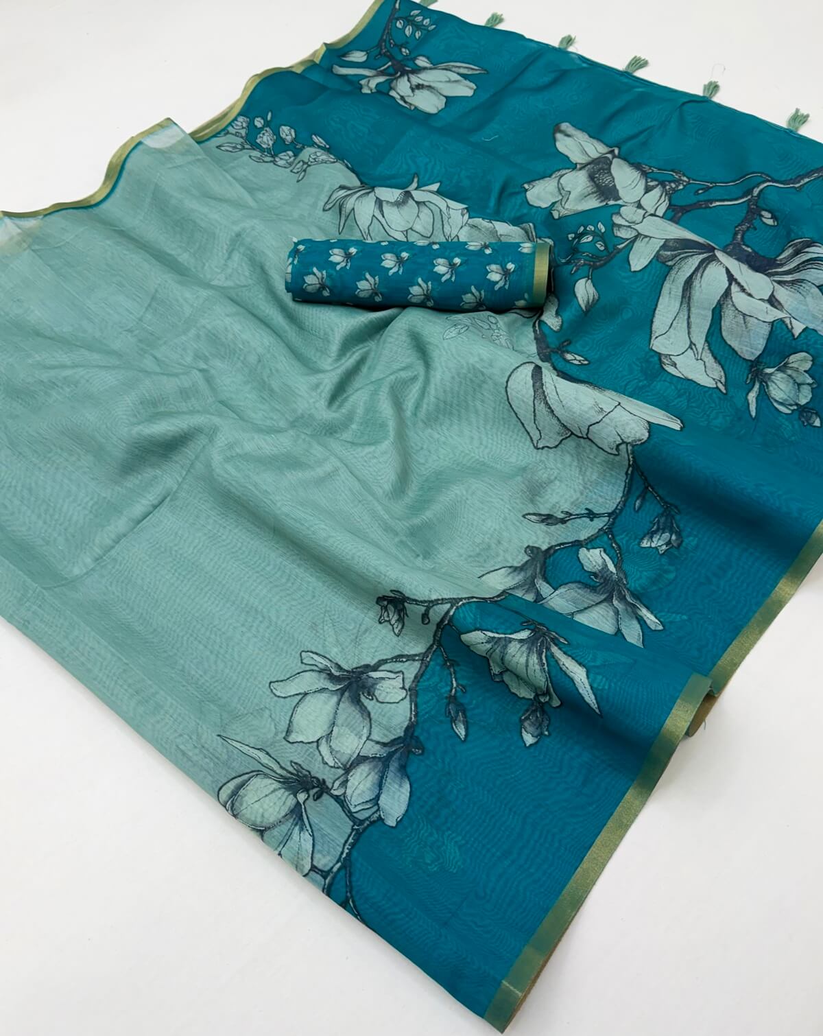 Enchanting Sea Green Printed Cotton Silk Saree With Felicitous Blouse Piece