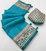 Lovely Firozi Printed Tussar Silk Saree With Extraordinary Blouse Piece
