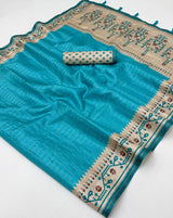 Lovely Firozi Printed Tussar Silk Saree With Extraordinary Blouse Piece