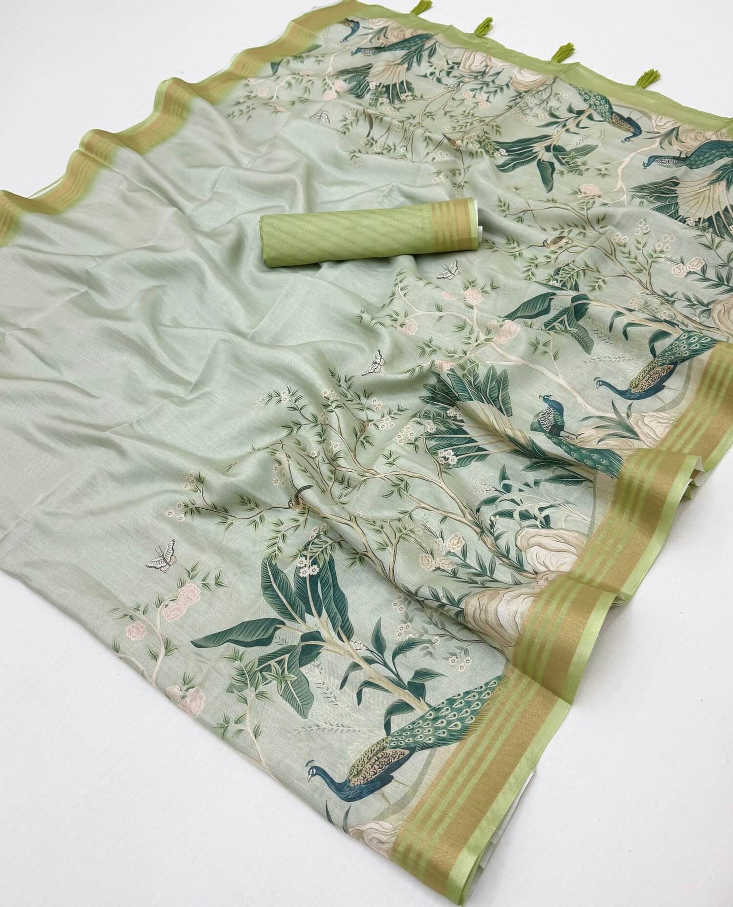Impressive Pista Printed Cotton Silk Saree With Prettiest Blouse Piece
