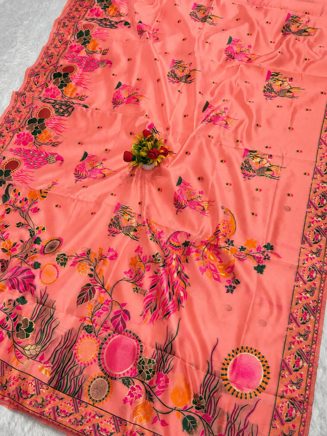 Pulsating Peach Pashmina Silk Saree With Comely Blouse Piece