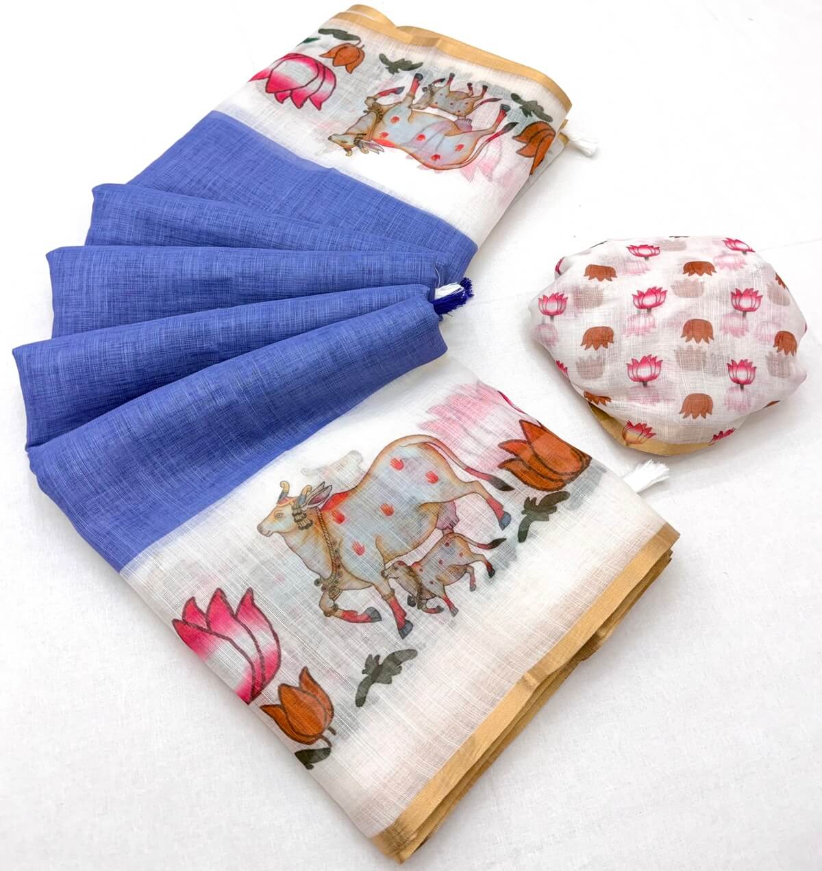 Sizzling Blue Printed Cotton Silk Saree With Vestigial Blouse Piece