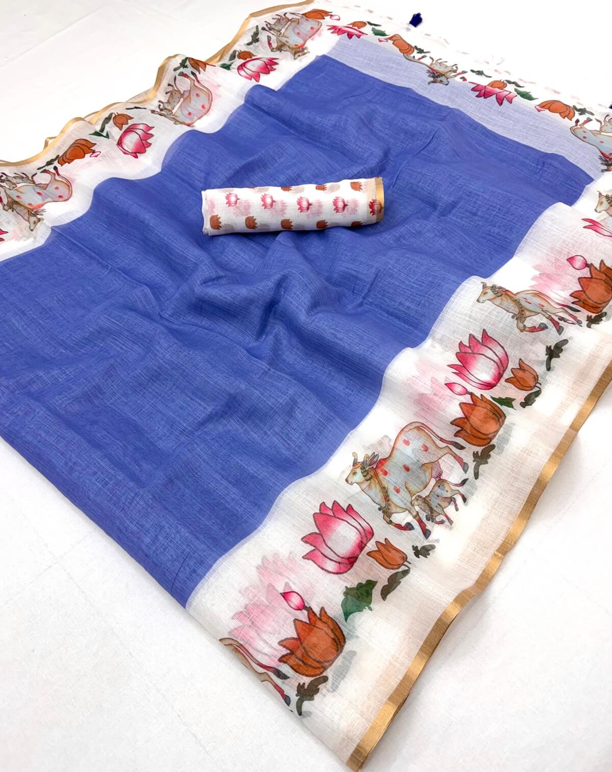 Sizzling Blue Printed Cotton Silk Saree With Vestigial Blouse Piece