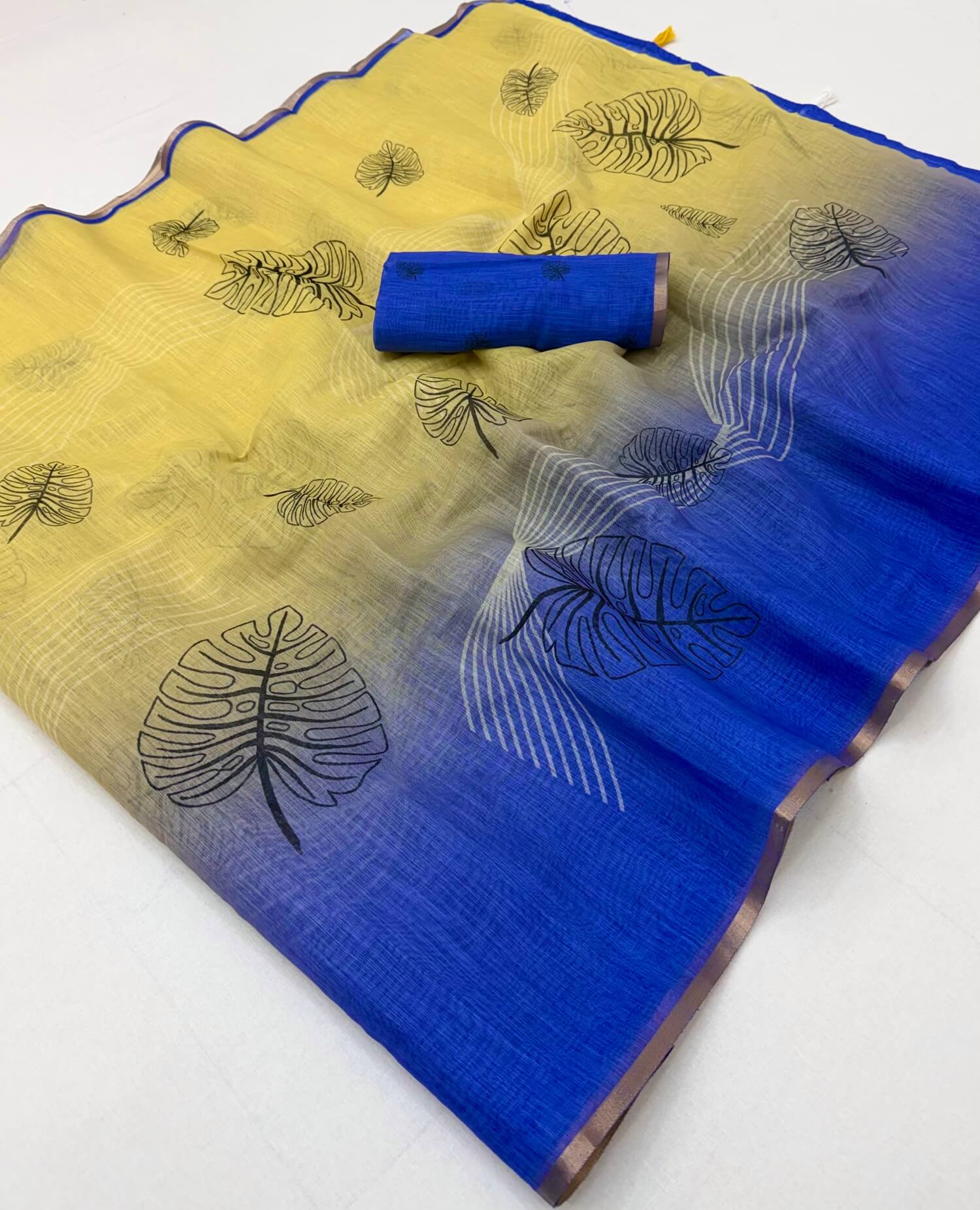Jubilant Yellow and Blue Printed Cotton Silk Saree With Nebula Blouse Piece