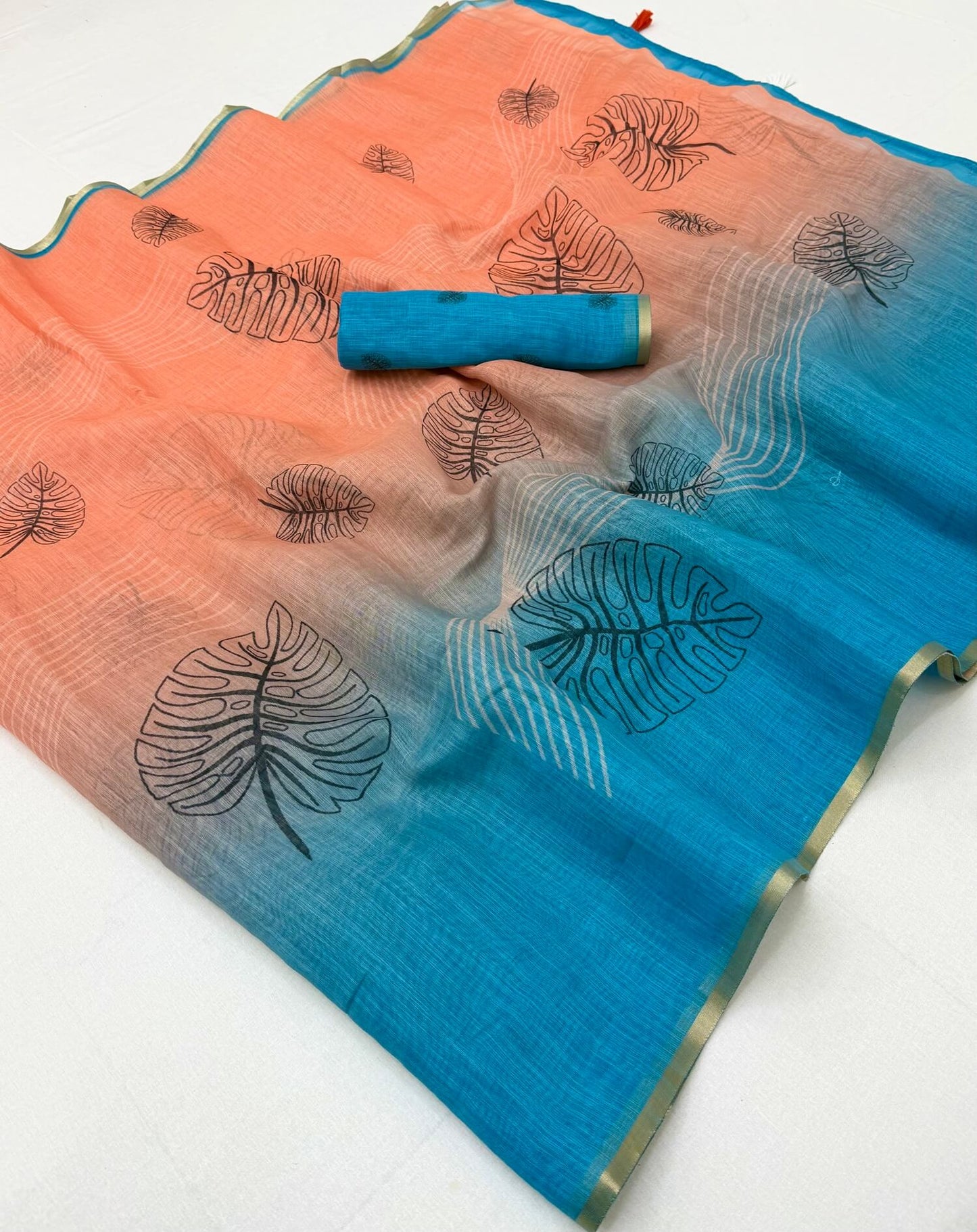 Phenomenal Peach and Blue Printed Cotton Silk Saree With Aplomb Blouse Piece
