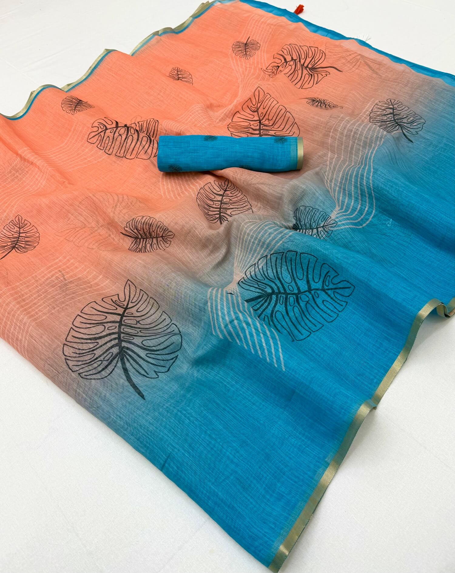 Phenomenal Peach and Blue Printed Cotton Silk Saree With Aplomb Blouse Piece