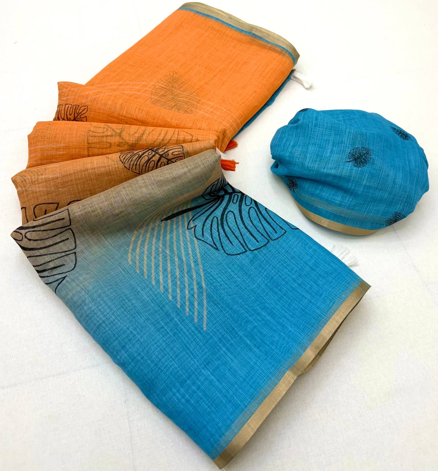 Devastating Orange and Blue Printed Cotton Silk Saree With Scintilla Blouse Piece
