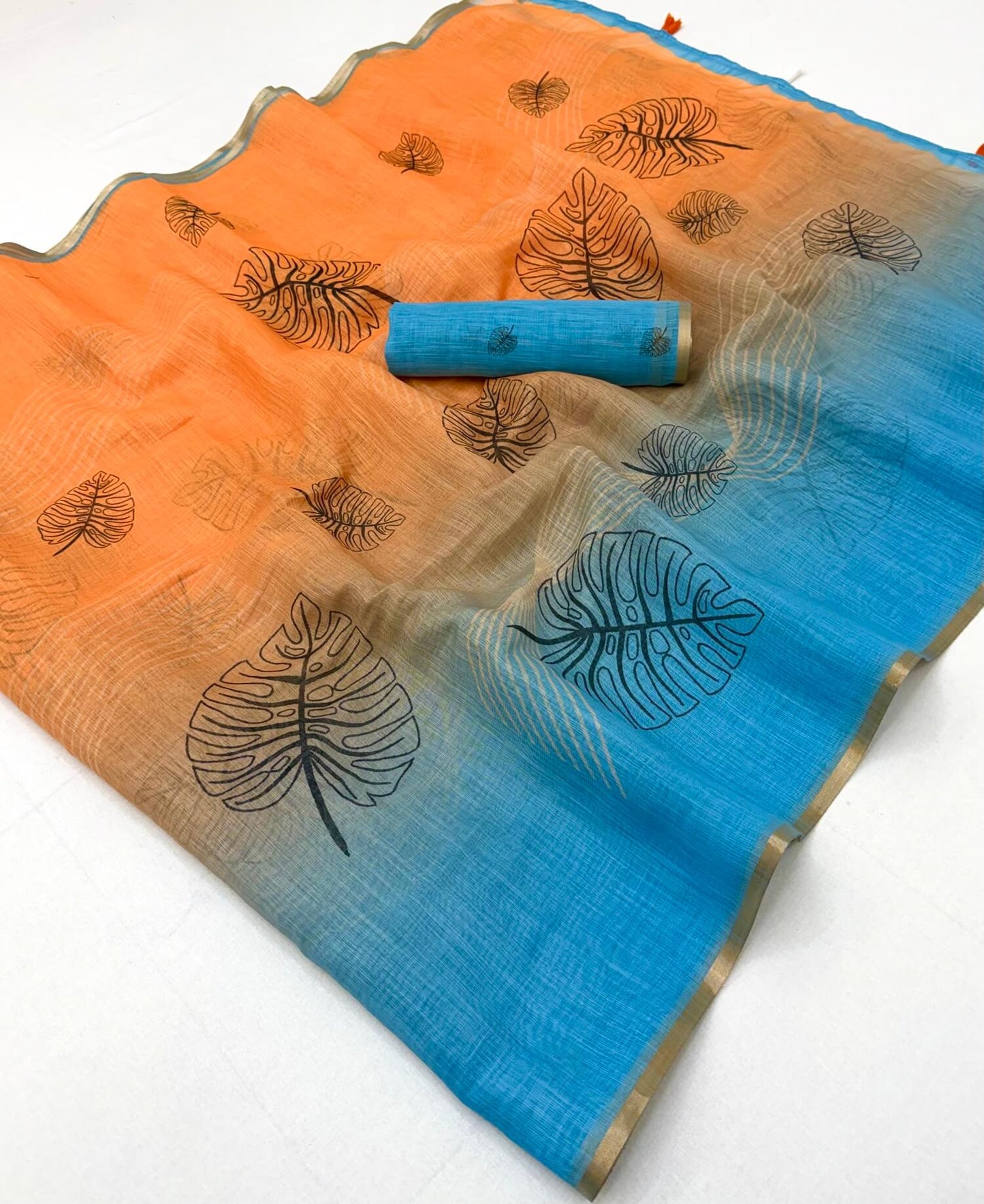 Devastating Orange and Blue Printed Cotton Silk Saree With Scintilla Blouse Piece