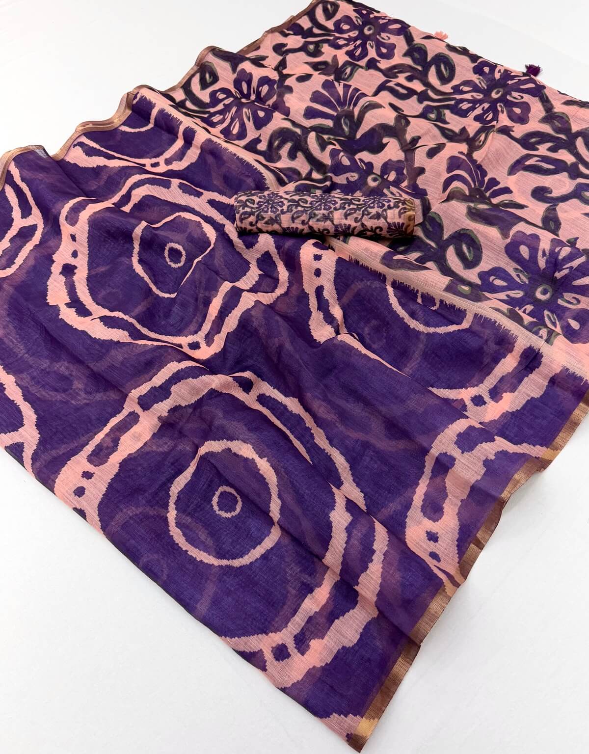 Magnetic Purple Printed Cotton Silk Saree With Prominent Blouse Piece