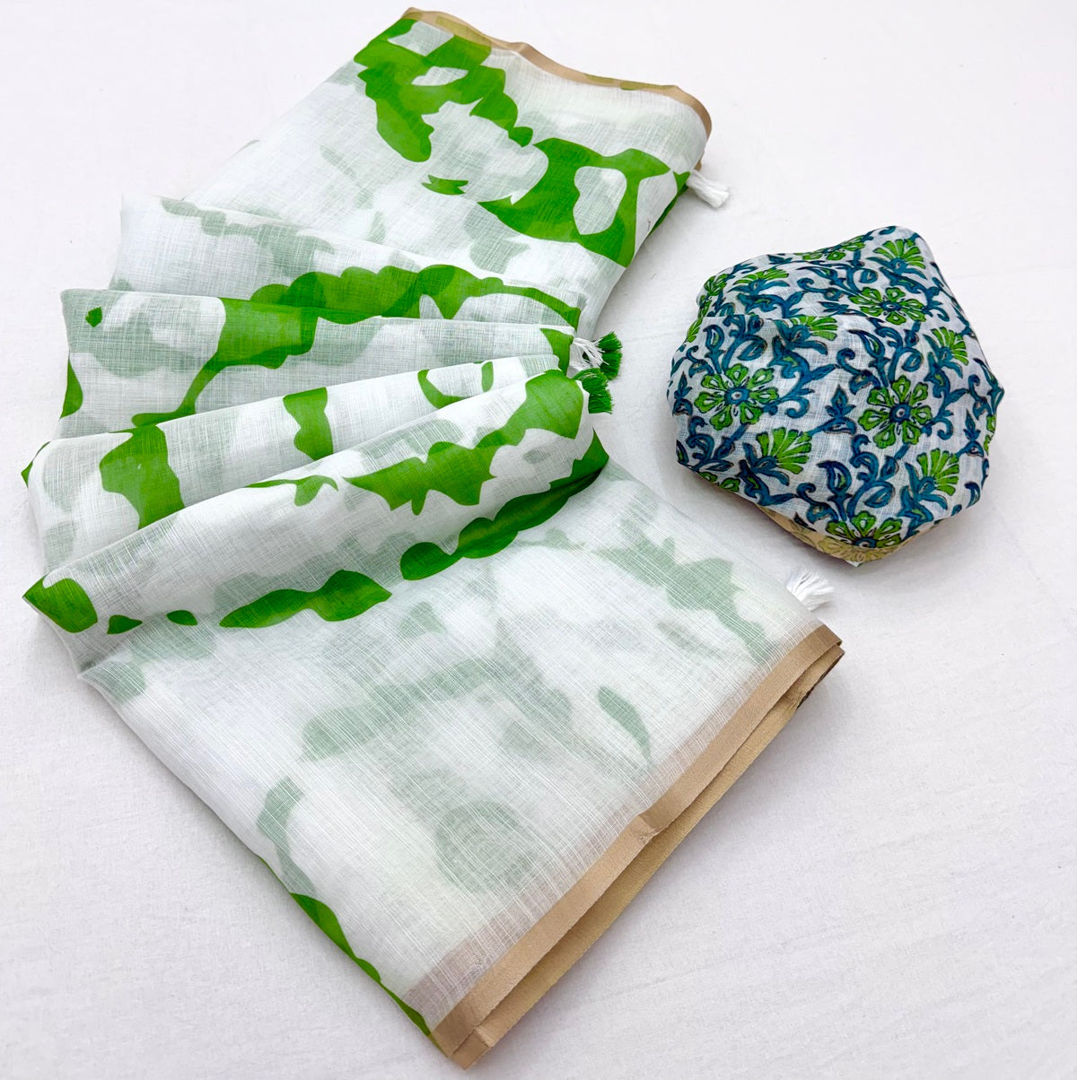 Delightful Off White Printed Cotton Silk Saree With Prettiest Blouse Piece