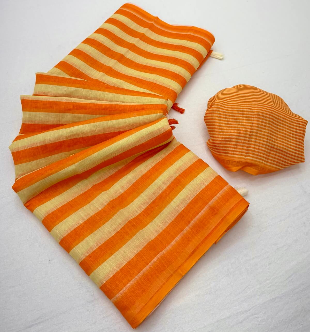 Intricate Orange Printed Cotton Silk Saree With Improbable Blouse Piece