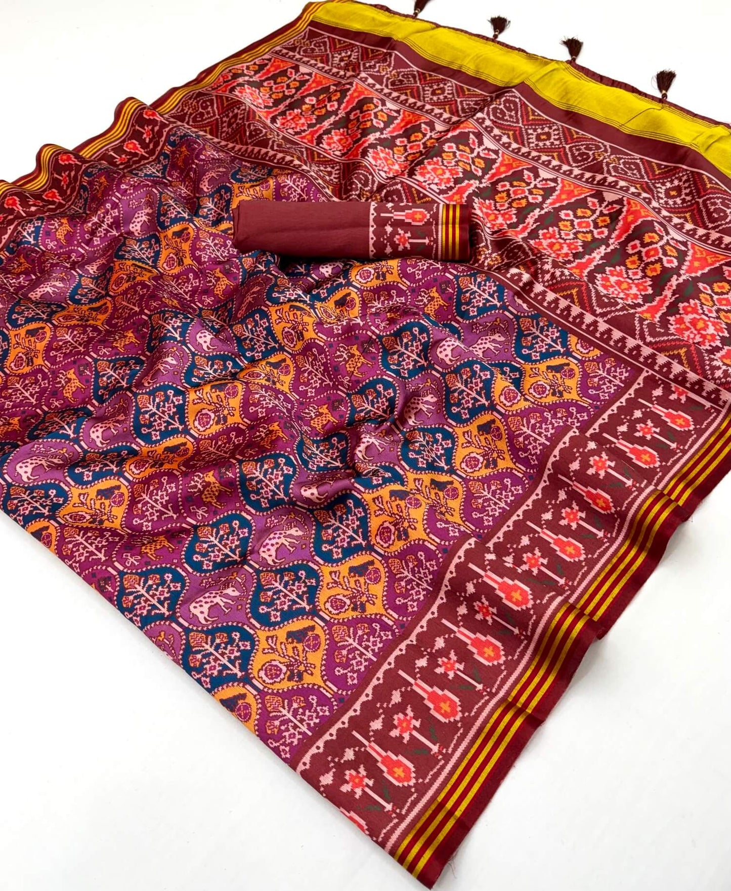 Lustrous Purple Printed Patola Handloom Silk Saree With Dazzling Blouse Piece