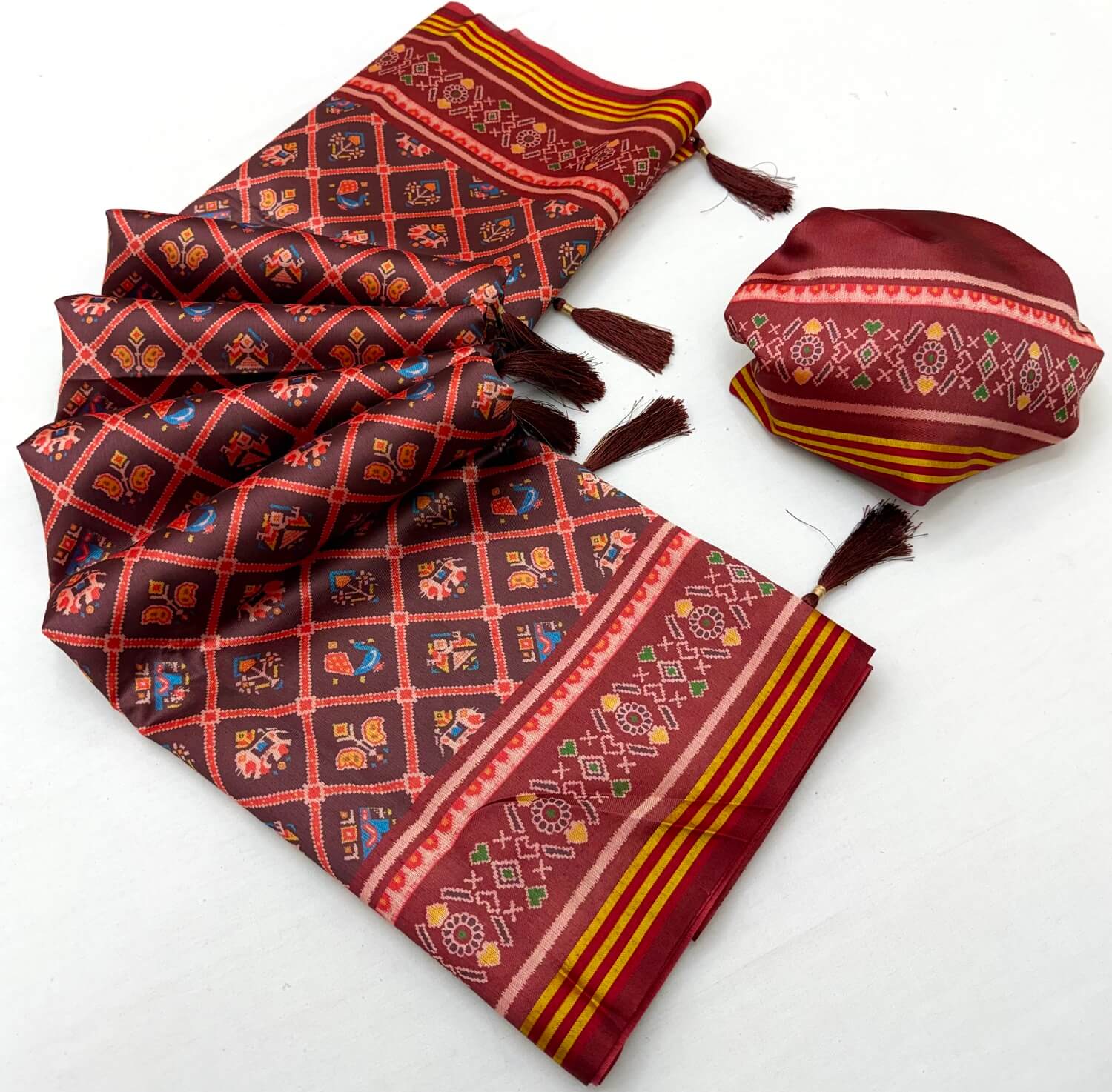 Jazzy Wine Printed Patola Handloom Silk Saree With Pulsating Blouse Piece