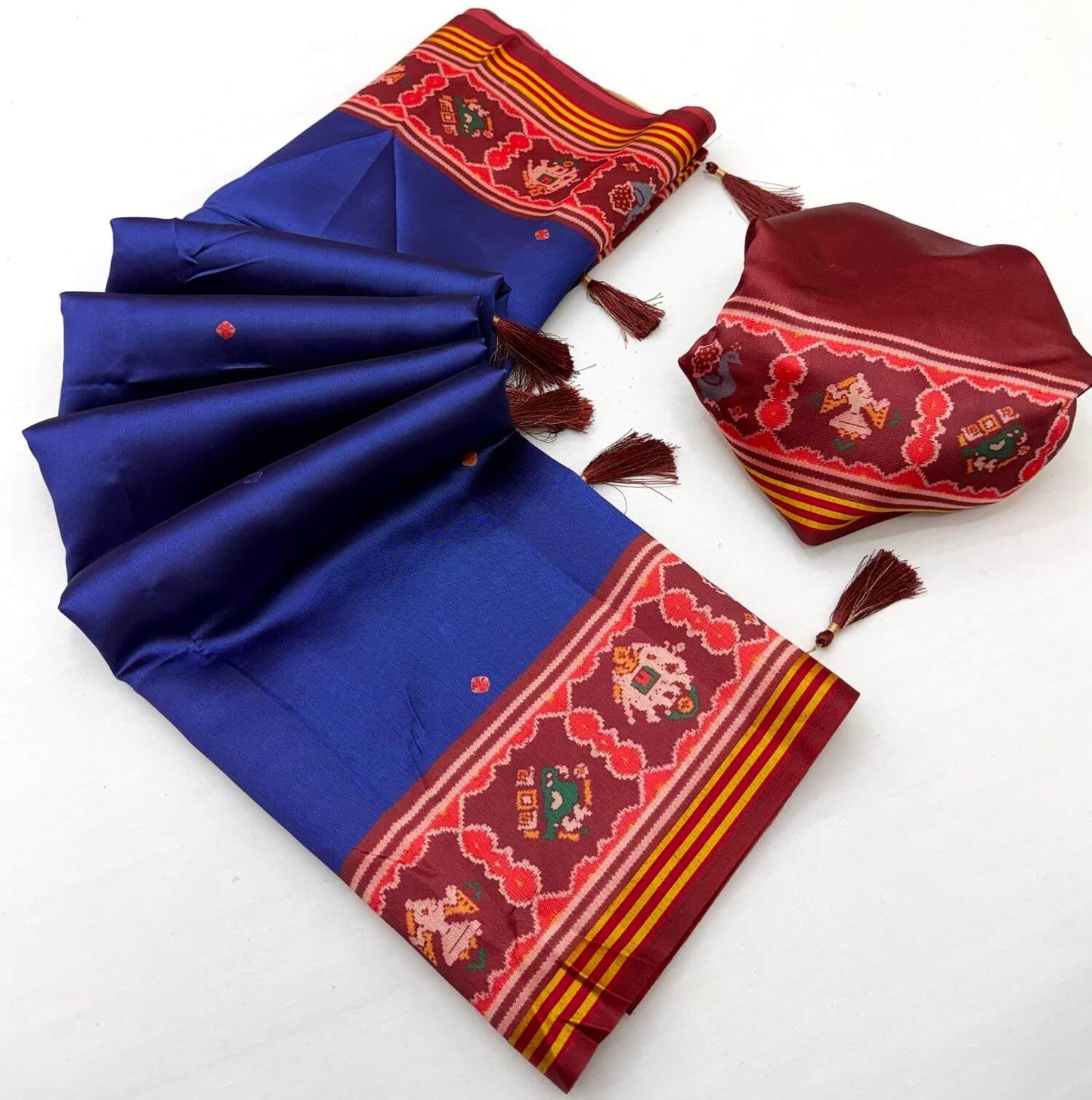Vestigial Royal Blue Printed Patola Handloom Silk Saree With Angelic Blouse Piece
