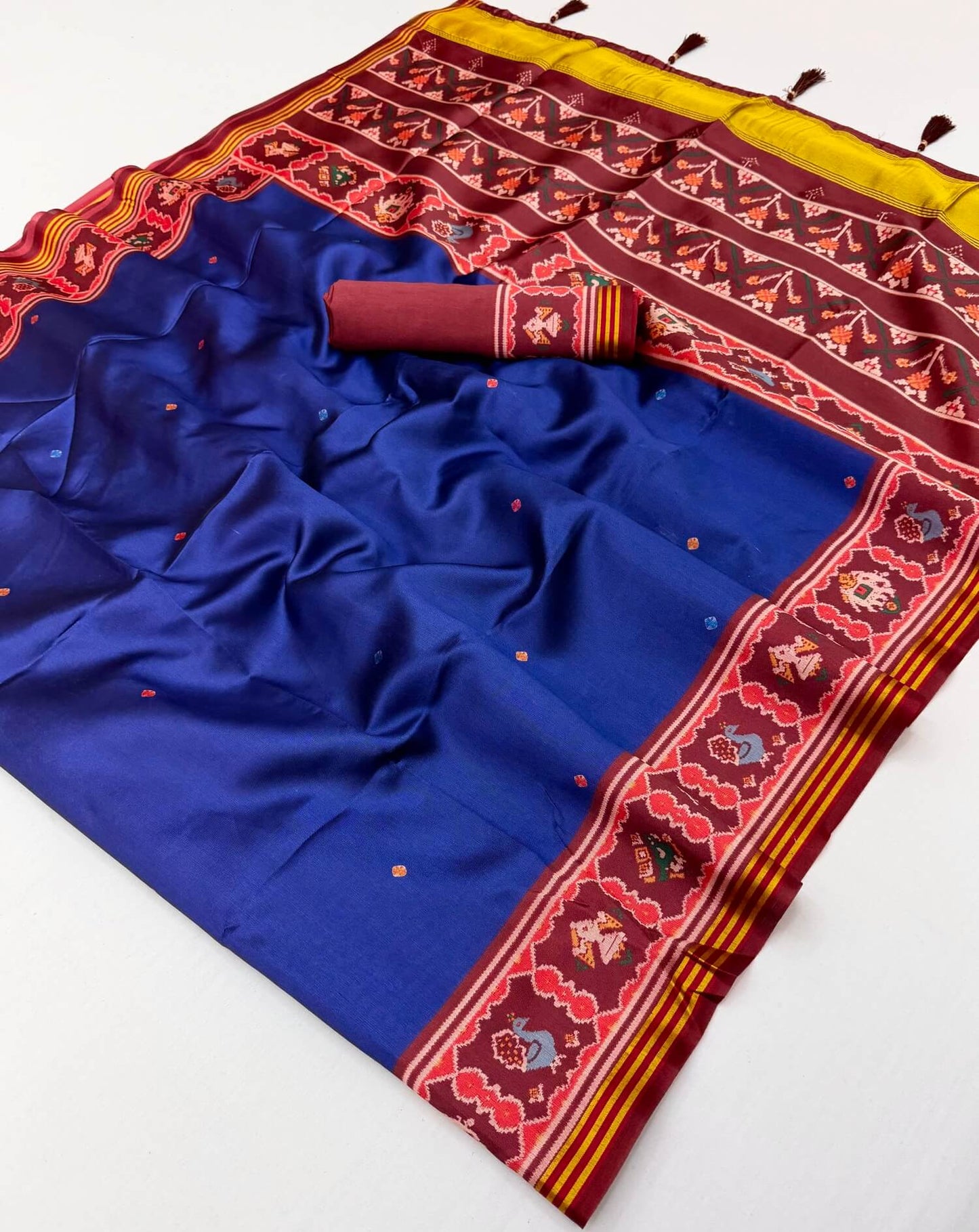 Vestigial Royal Blue Printed Patola Handloom Silk Saree With Angelic Blouse Piece