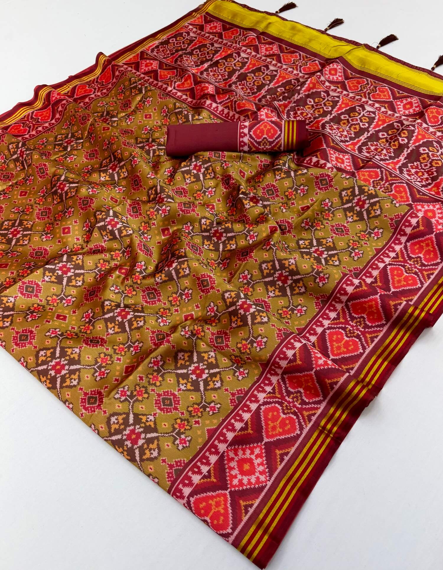 Imbrication Mustard Printed Patola Handloom Silk Saree With Glorious Blouse Piece