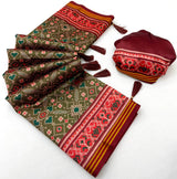 Traditional Green Printed Patola Handloom Silk Saree With Intricate Blouse Piece