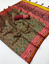 Traditional Green Printed Patola Handloom Silk Saree With Intricate Blouse Piece