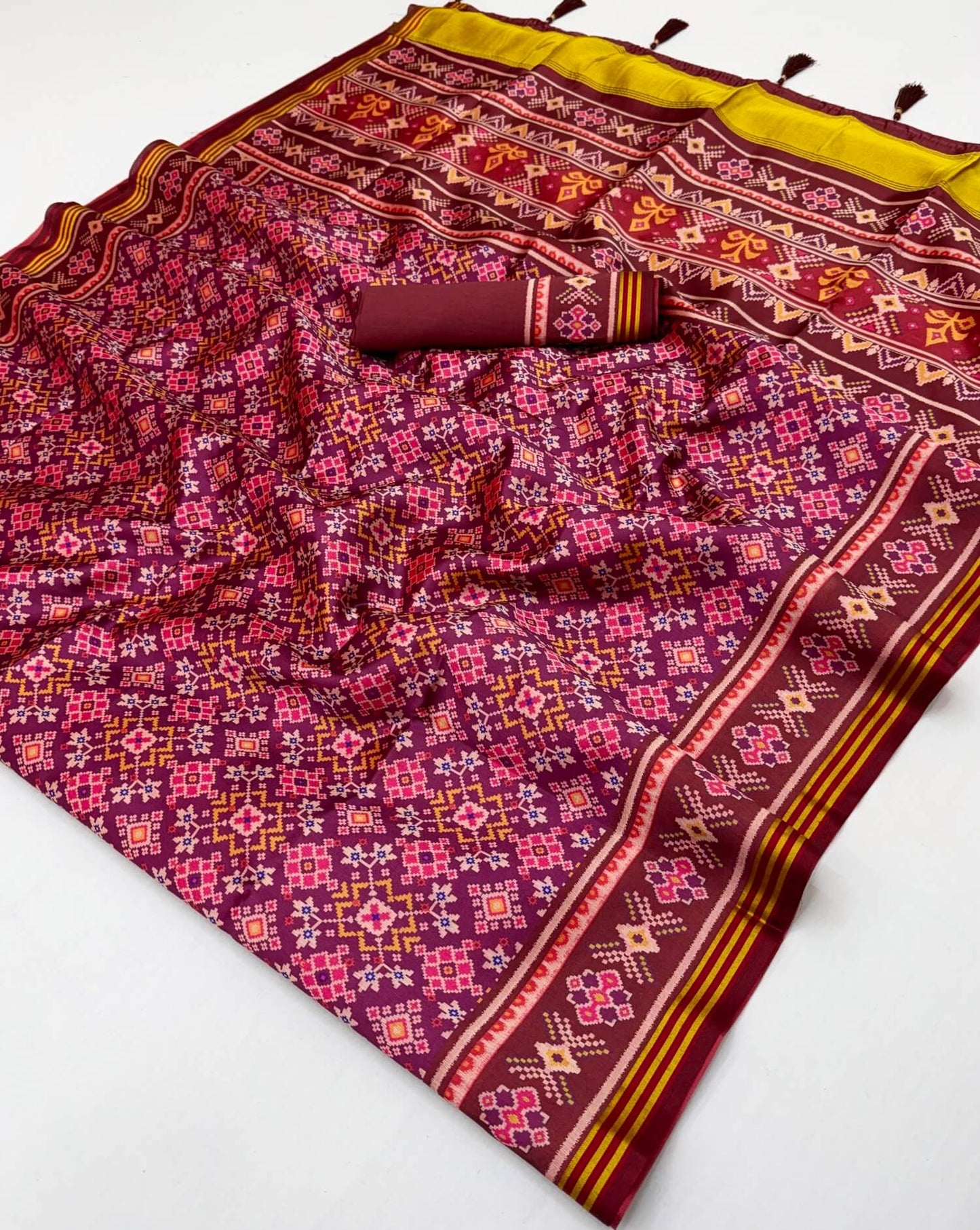 Evocative Purple Printed Patola Handloom Silk Saree With Enchanting Blouse Piece