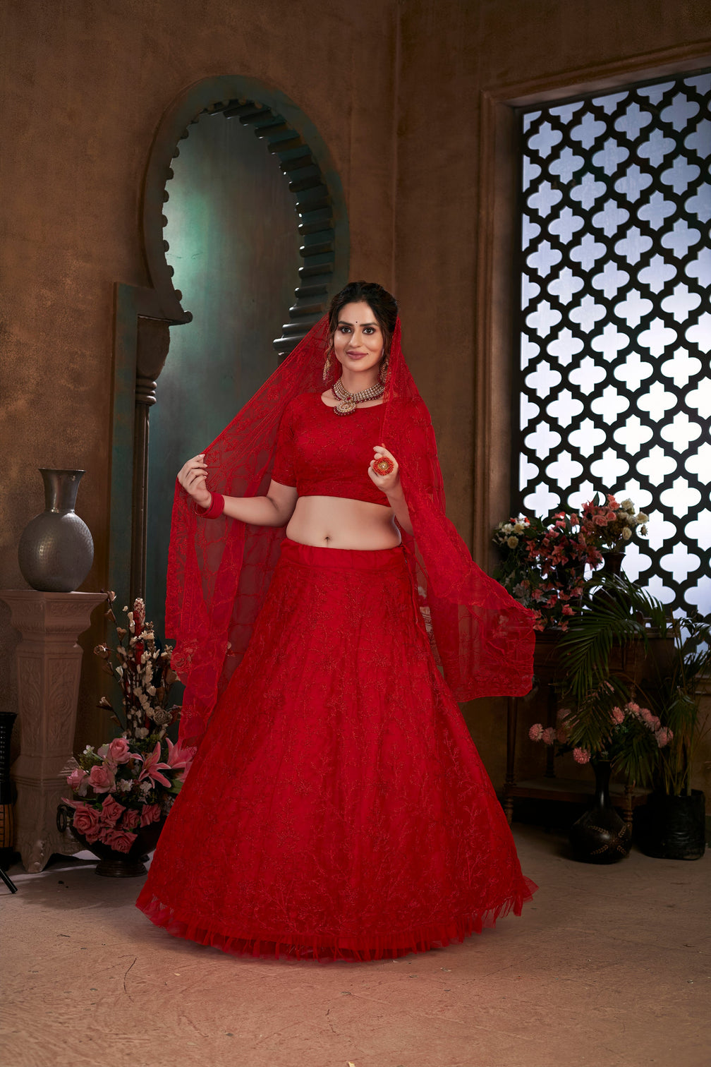 Red Thread Embroidered Net Wedding Wear Lehenga Choli