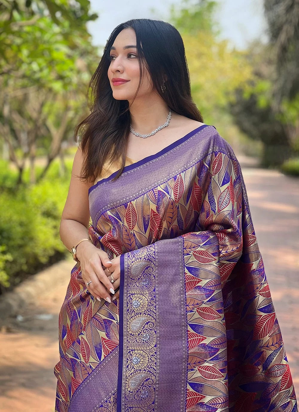 Royal blue kanchipattu silk saree with all over weaves contrast border