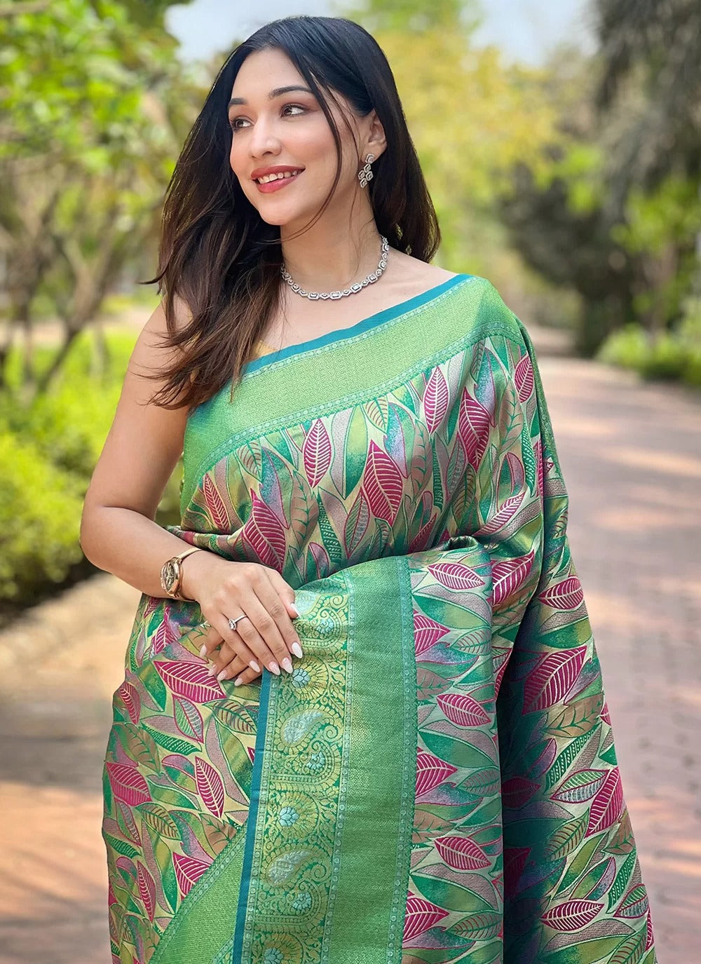 Sea green kanchipattu silk saree for indian weddings with contrast weaving border