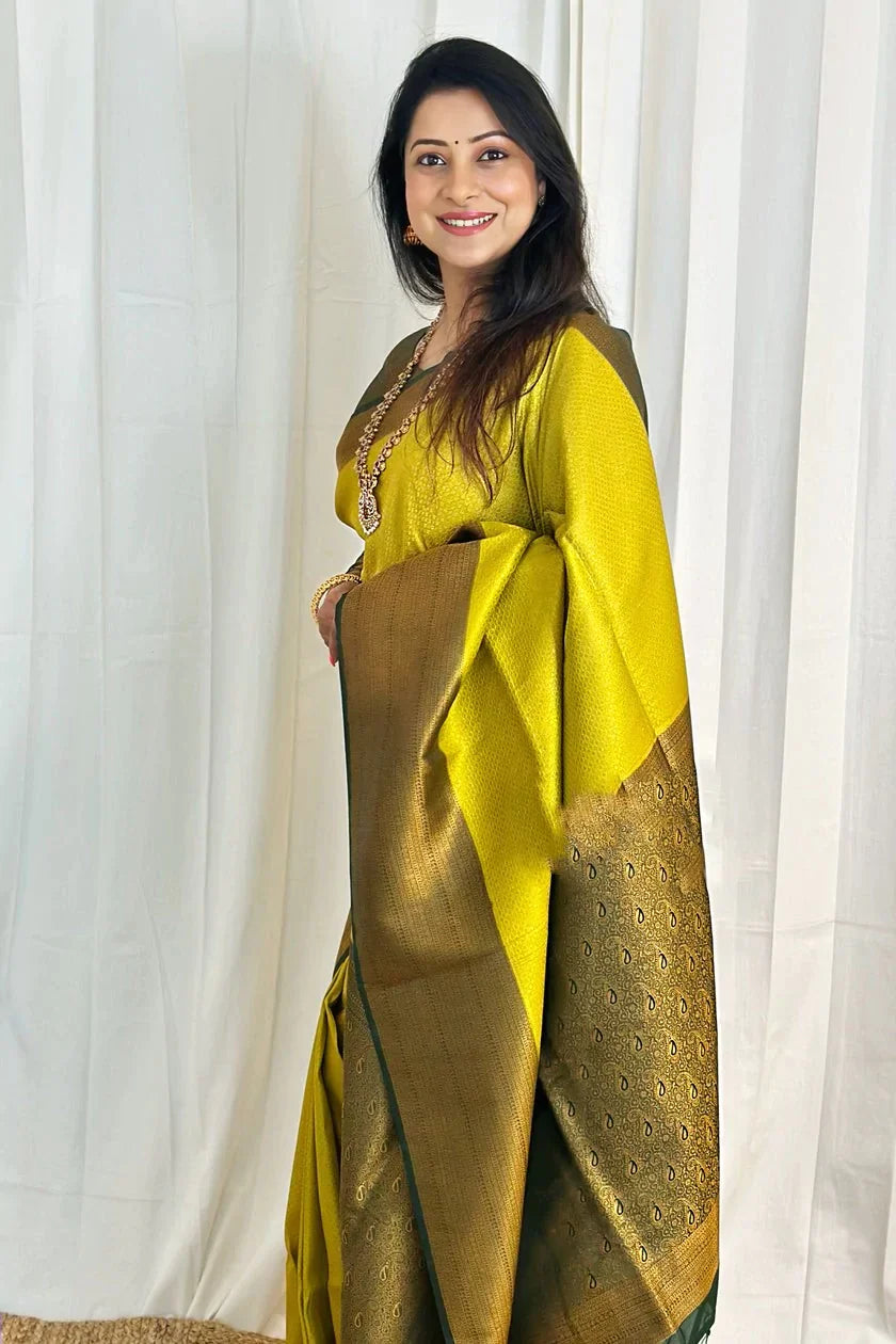 Snazzy Lemon Soft Silk Saree With Inspiring Blouse Piece