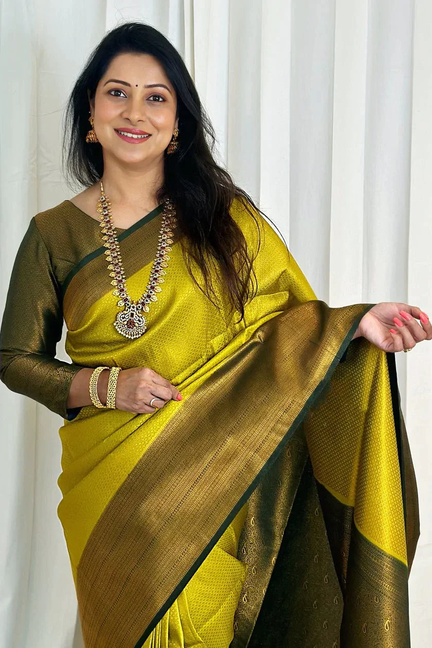 Snazzy Lemon Soft Silk Saree With Inspiring Blouse Piece