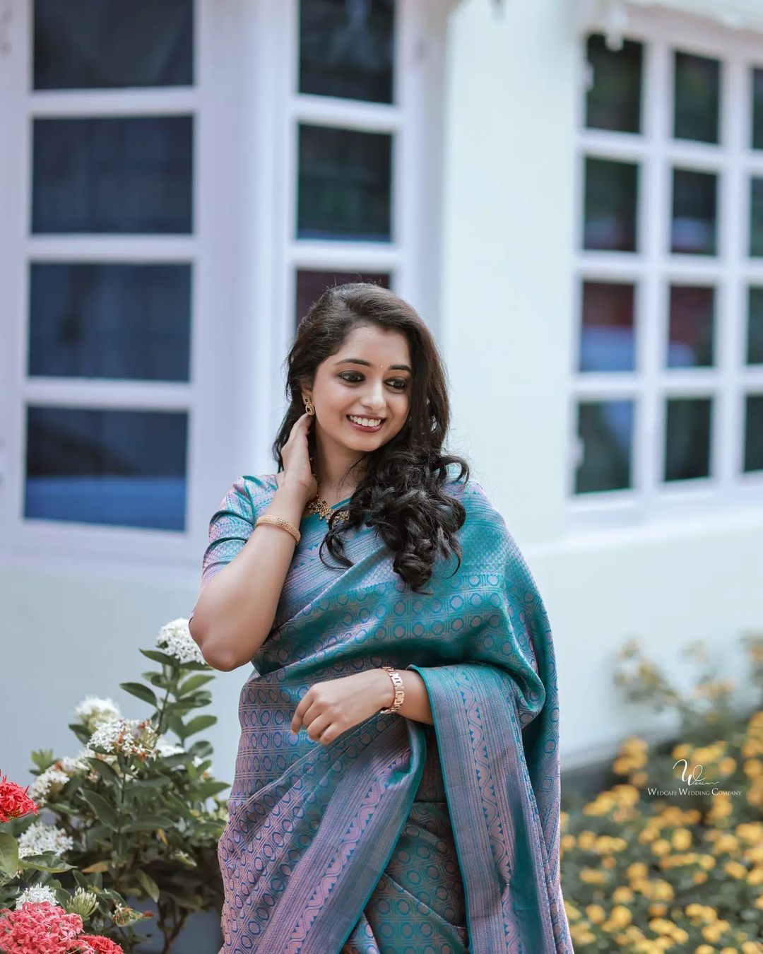 Snazzy Firozi Soft Banarasi Silk Saree with Glittering Blouse Piece