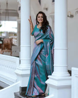 Snazzy Firozi Soft Banarasi Silk Saree with Glittering Blouse Piece