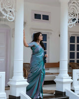 Snazzy Firozi Soft Banarasi Silk Saree with Glittering Blouse Piece