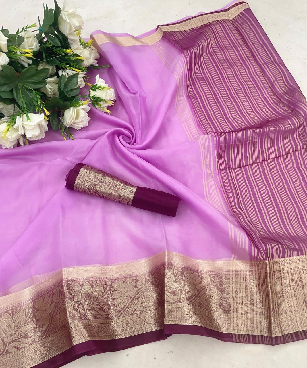 Ravishing Lavender Orgenza  Silk Saree With Intricate Blouse Piece