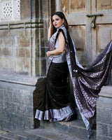 Opulent Black Soft Banarasi Silk Saree With Glowing Blouse Piece