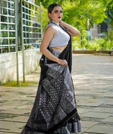 Opulent Black Soft Banarasi Silk Saree With Glowing Blouse Piece