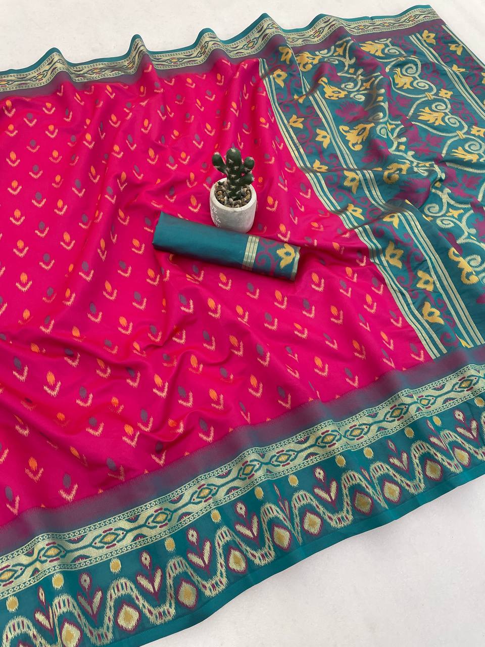 Efflorescence Dark Pink Banarasi Ikkat Silk Saree With Angelic Blouse Piece