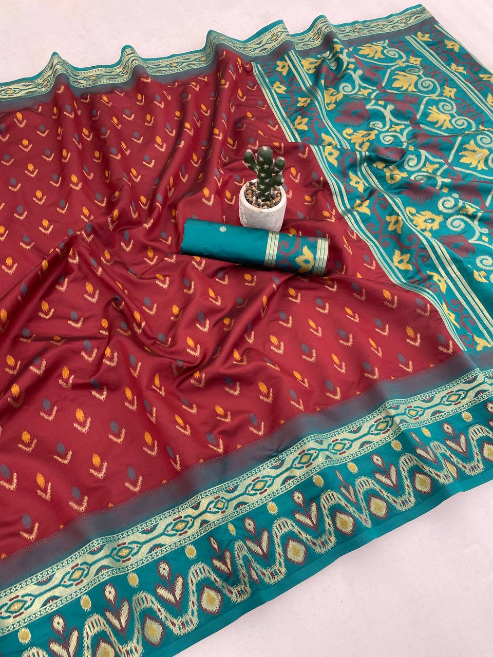 Charismatic Maroon Banarasi Ikkat Silk Saree With Redolent Blouse Piece