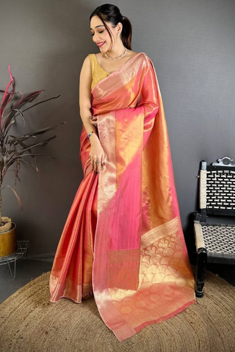 Stunning Peach Banarasi Tissue Silk Saree With Palimpsest Blouse Piece
