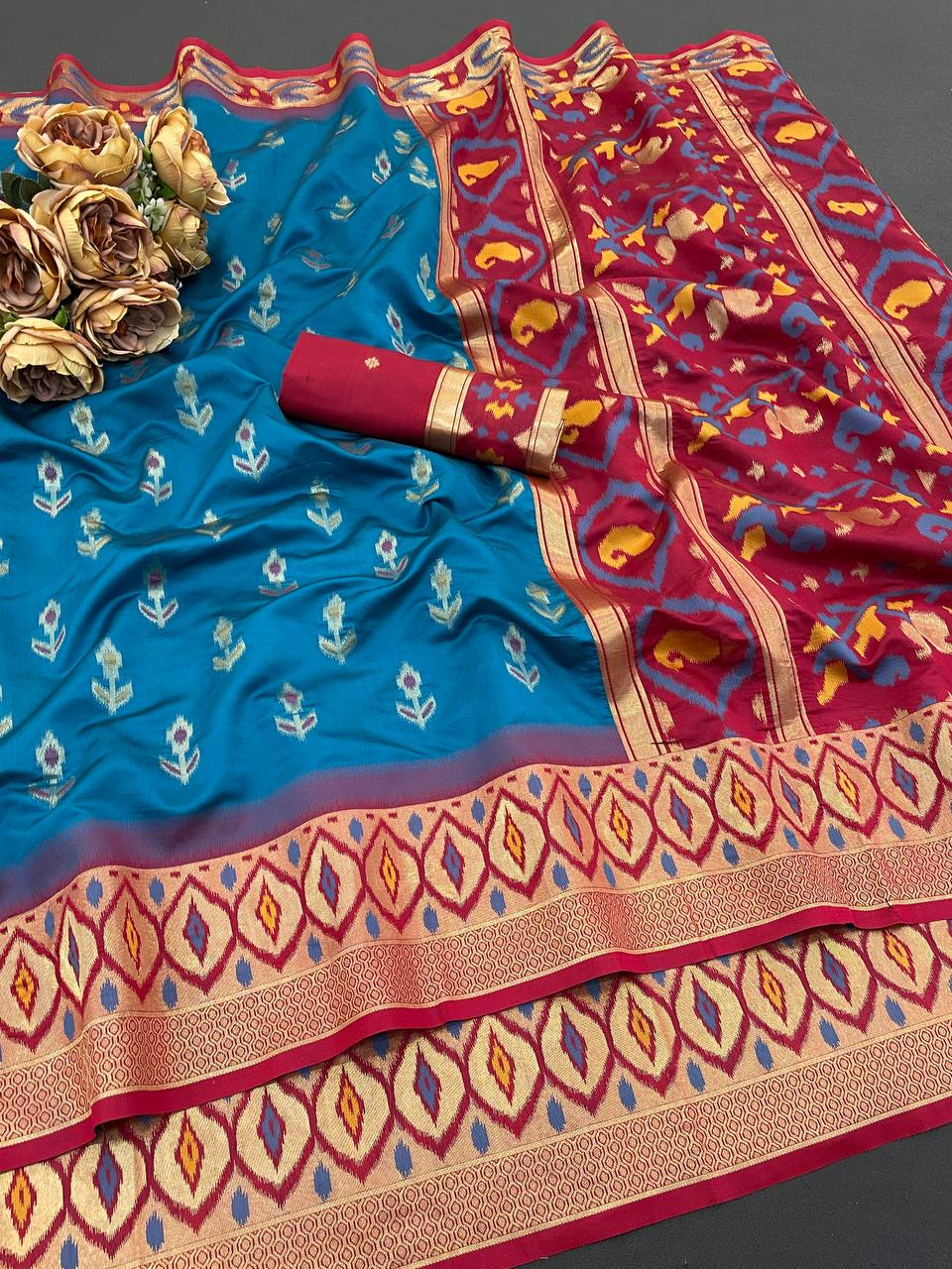 Evocative Firozi Banarasi Ikkat Silk Saree With Staggering Blouse Piece