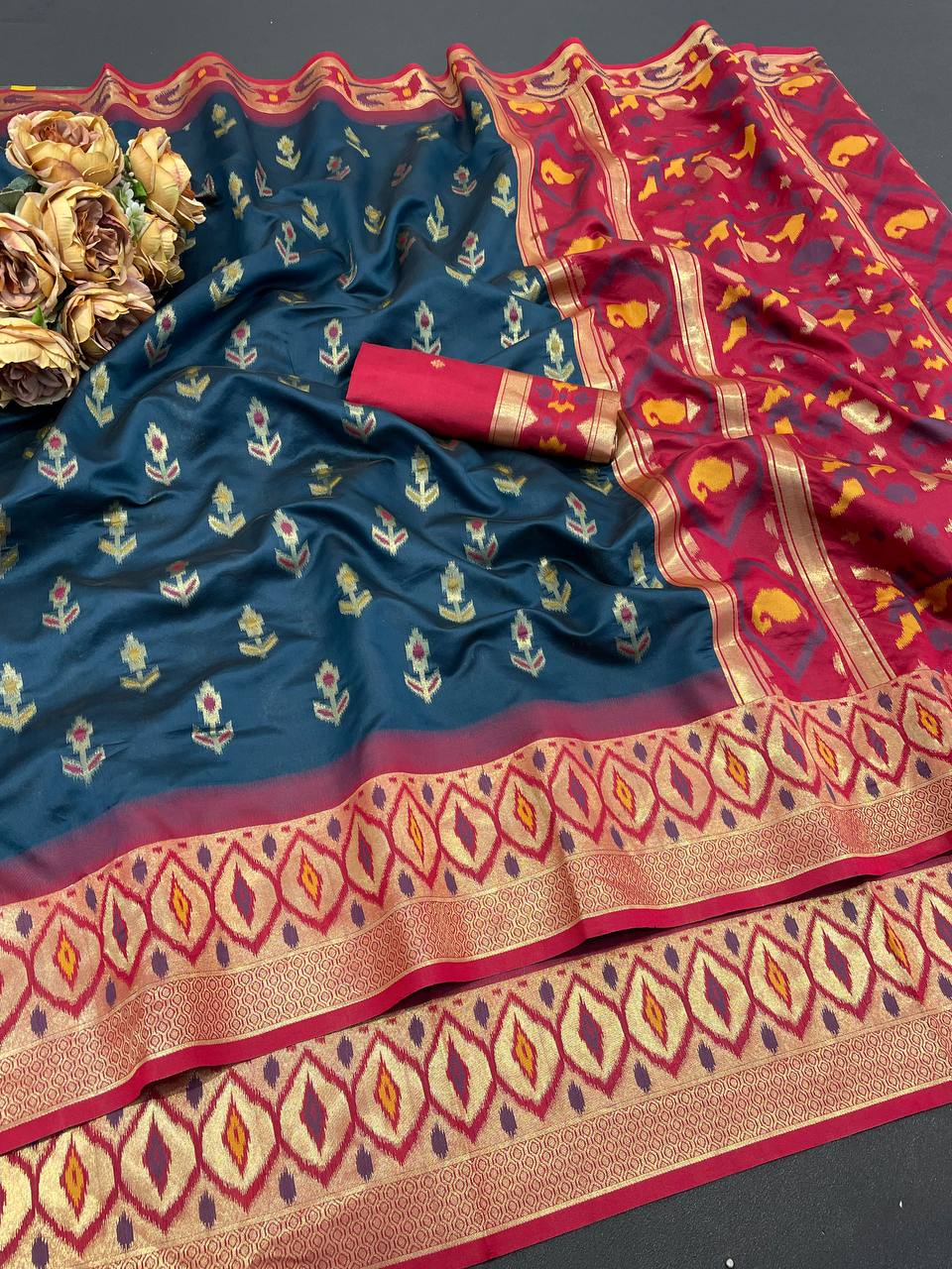 Blooming Navy Blue Banarasi Ikkat Silk Saree With Comely Blouse Piece