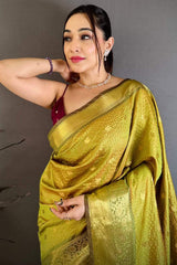 Wonderful Mehndi Banarasi Tissue Silk Saree With Radiant Blouse Piece