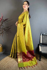 Wonderful Mehndi Banarasi Tissue Silk Saree With Radiant Blouse Piece