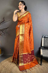 Exceptional Orange Banarasi Tissue Silk Saree With Jazzy Blouse Piece