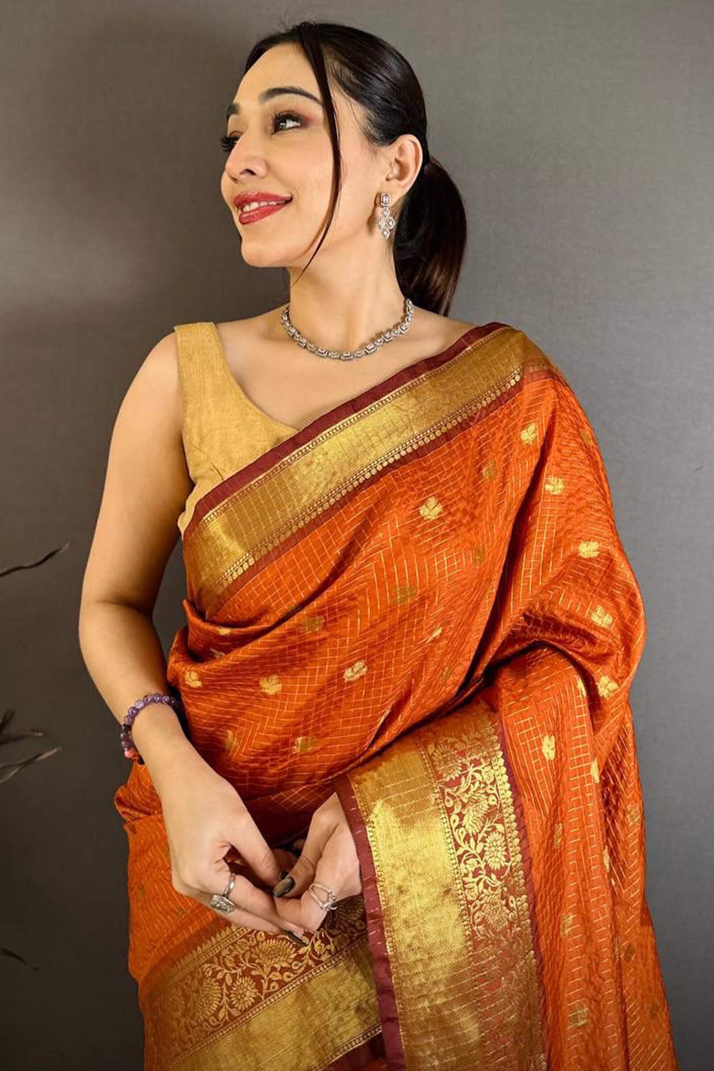 Exceptional Orange Banarasi Tissue Silk Saree With Jazzy Blouse Piece