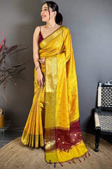 Pleasant Yellow Banarasi Tissue Silk Saree With Tantalizing Blouse Piece