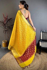 Pleasant Yellow Banarasi Tissue Silk Saree With Tantalizing Blouse Piece
